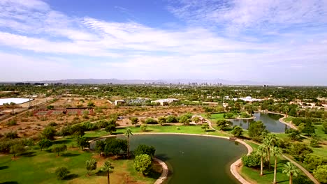 aerial short pull in to phoenix skyline from granada park