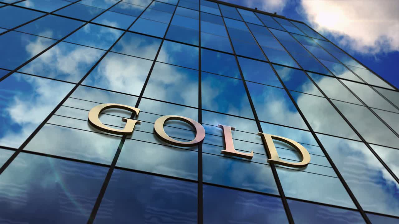 Gold reserve bank glass skyscraper with mirrored sky loop animation