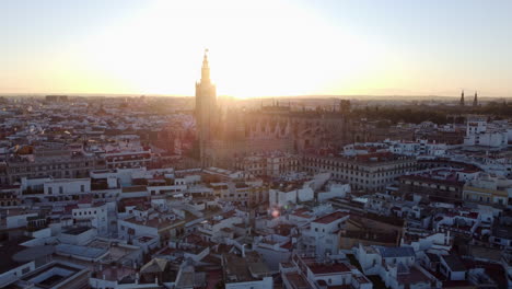 cinematic bright sunset behind seville cathedral, spain