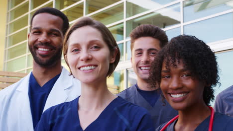 Medical-team-smiling-to-camera,-close-up-panning-shot