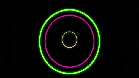 Animation-of-green-and-pink-neon-circles-on-black-background