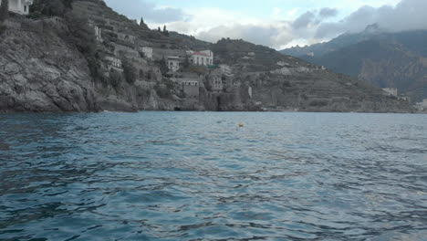 Drone-shot-over-the-coast-of-Amalfi,-Italy