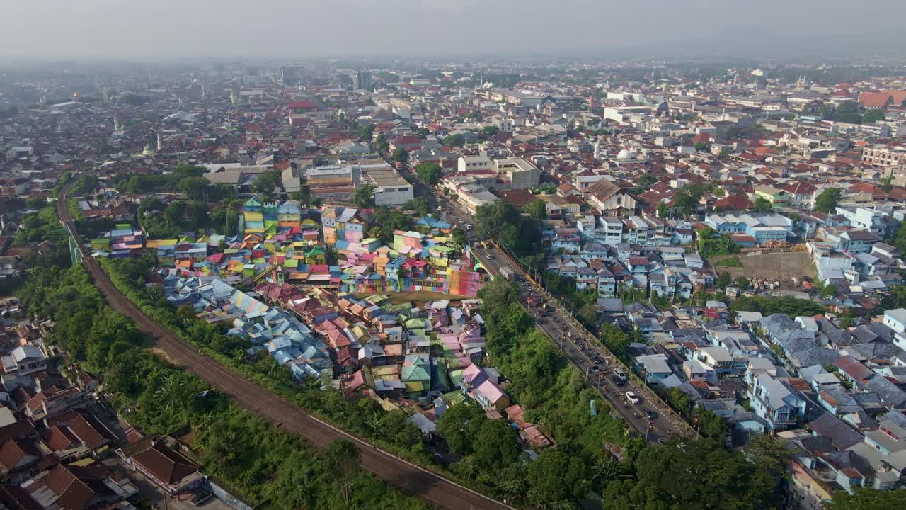 Controversial slum tourism in the downtown of the second biggest city of East Java, Malang, Indonesia, is situated side by side with the railway track and bustling traffic amidst an overpopulated area