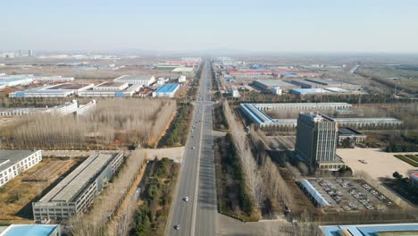 aerial dolly shot revealing the linyl industrial area in the outskirts, china