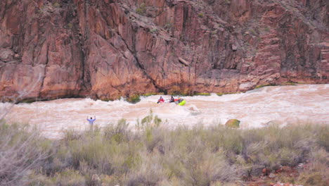 group of people rafting down colorado river in grand canyon