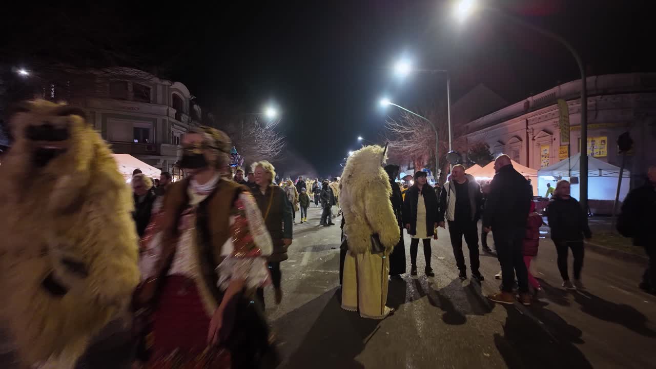 Nighttime Carnival Parade in a European Town