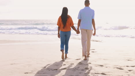 love, holding hands and couple on beach