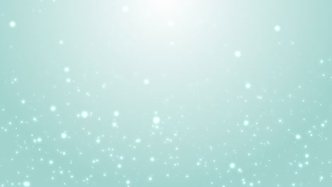 material de video de fondo azul con partículas de brillo en ascenso que se pueden reproducir en un bucle. resolución 4k.