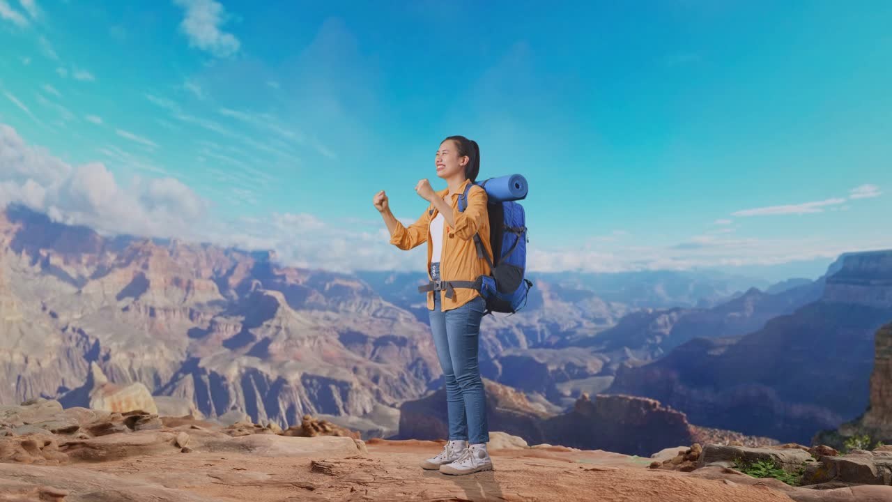 Full Body Side View Of Asian Female Hiker With Mountaineering Backpack Screaming Goal Celebrating The Success While Traveling At The Top Of Mountain
