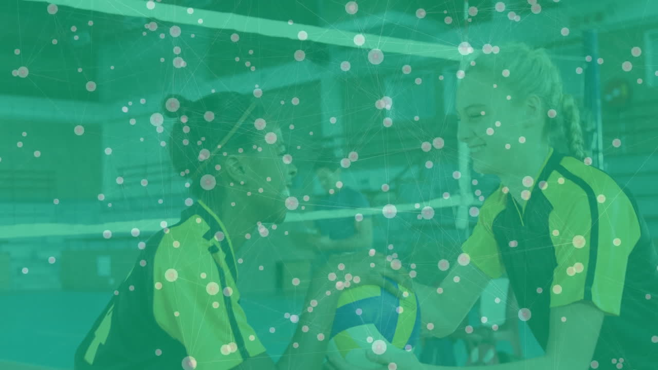 Holding volleyball, two athletes with network connections animation overlay in gym