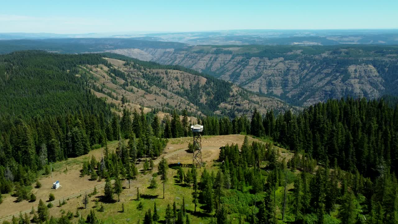 US, Oregon, Elgin, 2025-08-10 - Drone view of a fire lookout at Lookout Mountain overlooking the Grande Ronde River valley