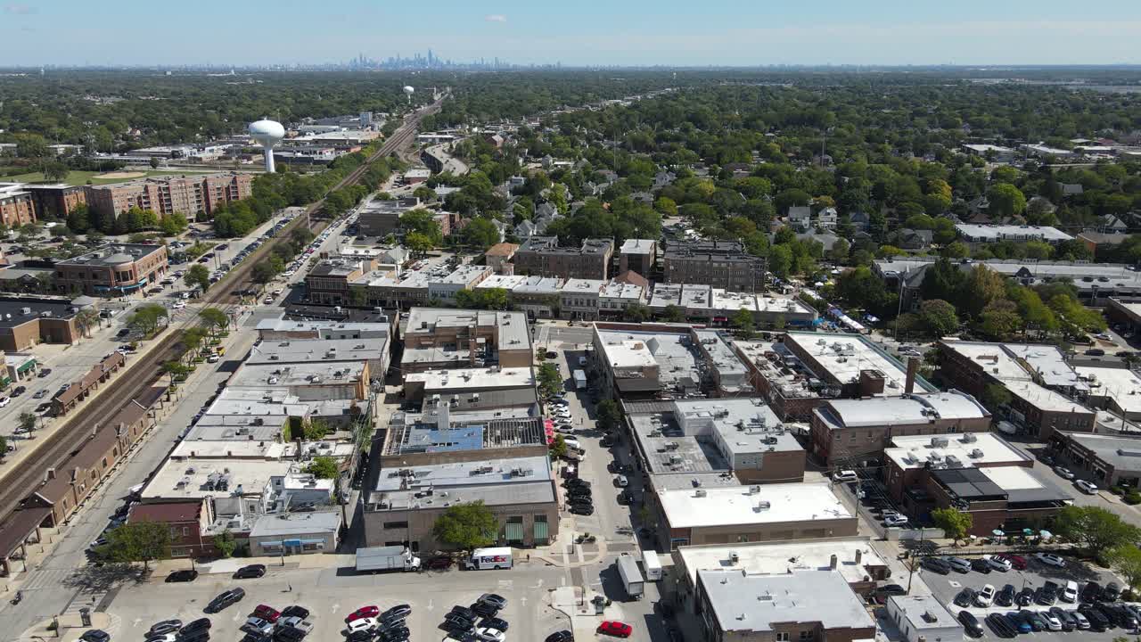 La Grange, IL on a sunny fall day, showcasing streets, buildings, and the suburban landscape With Downtown Chicago in Background. Crane Up Day E
