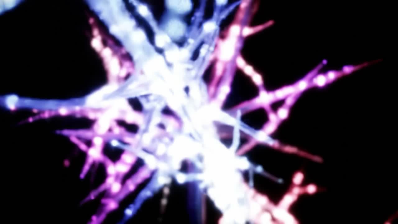 Vibrant light patterns in shades of pink and blue dance against a black backdrop, creating an enchanting visual experience. The intricate designs evoke a sense of wonder and creativity.