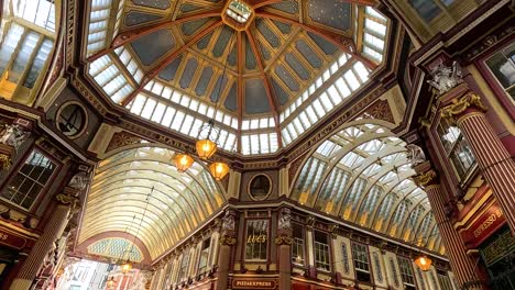 a bustling market under a stunning glass roof