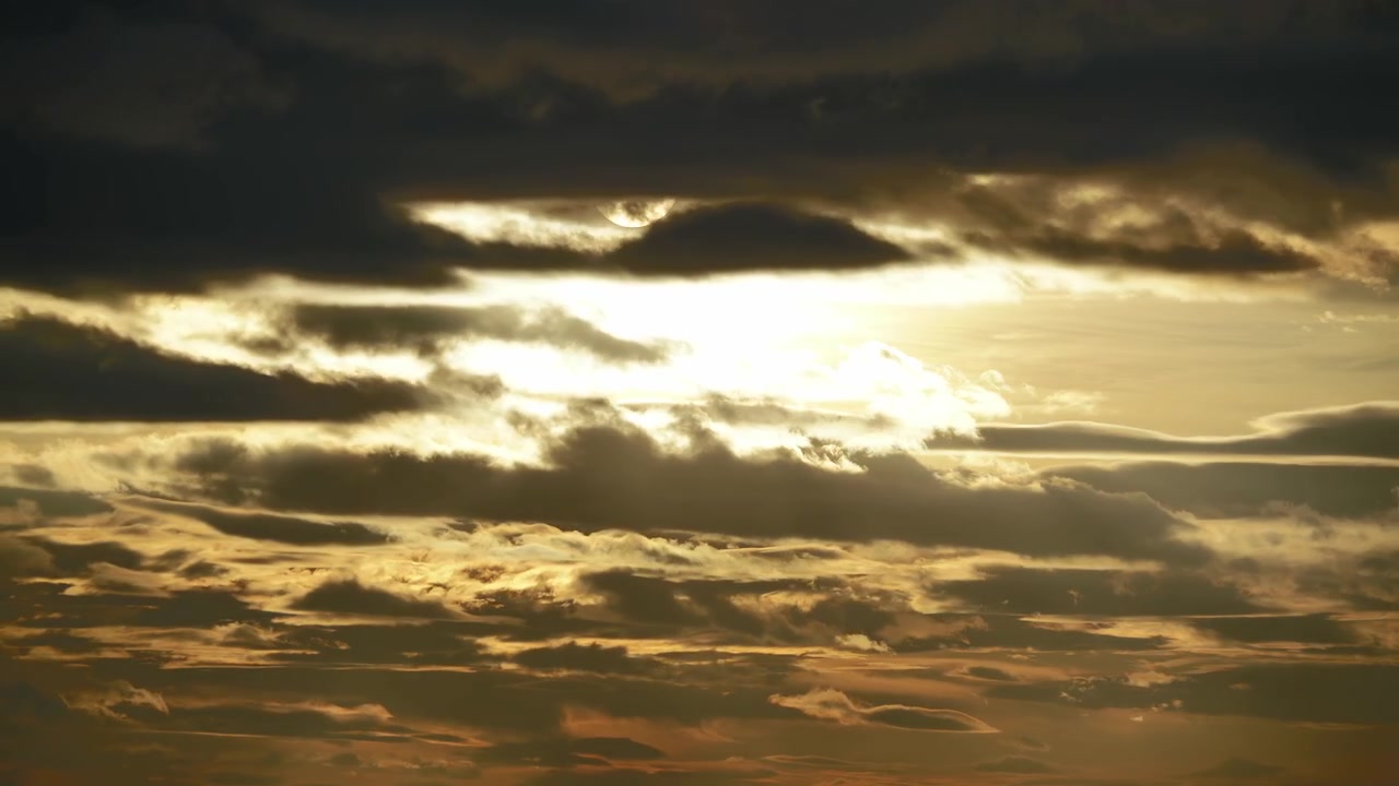 Golden Sunset Clouds Moving Across the Sky