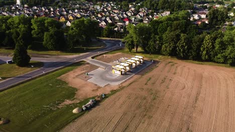 Carwash-near-small-town-in-Lithuania,-aerial-drone-orbit-view