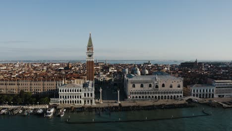 Wide aerial view of St Mark's Campanile standing tall among Venice, Italy's culturally rich landscape.