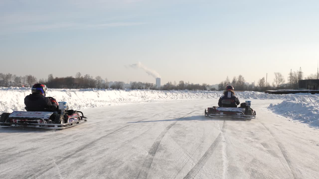 People Go-Karting on Ice in Winter