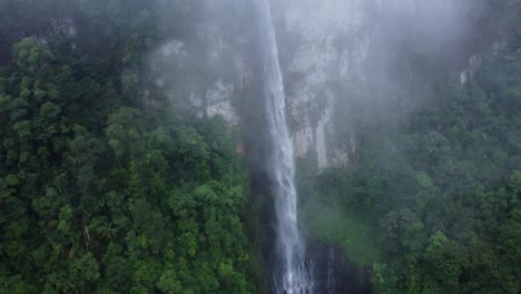 large and powerful waterfall found along the quebrada gata trail in costa rica