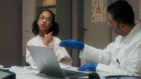 doctor discussing with young patient