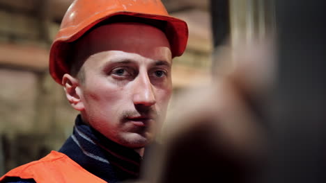 male worker in uniform. portrait of factory man worker