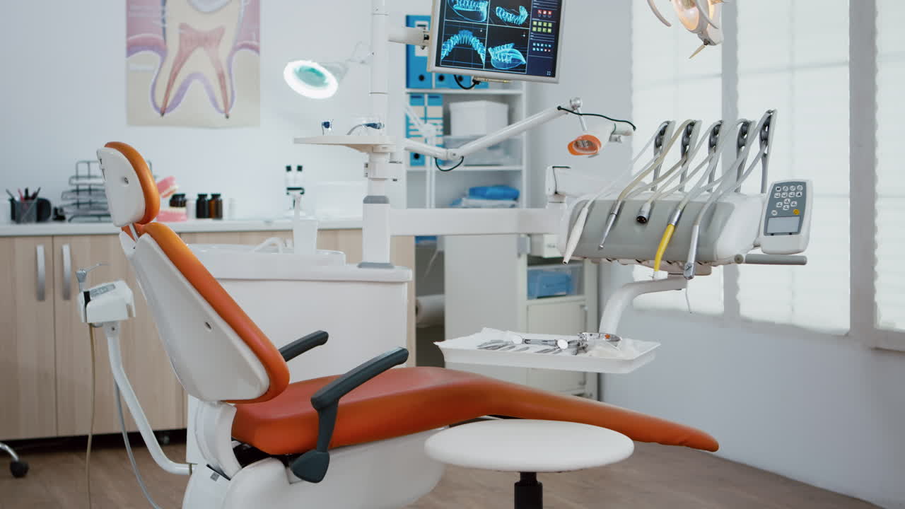 Interior of modern dental office in hospital with dentistry orthodontic furniture.