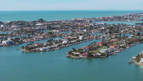 aerial drone view of luxury neighborhood isle of palms in treasure island, florida