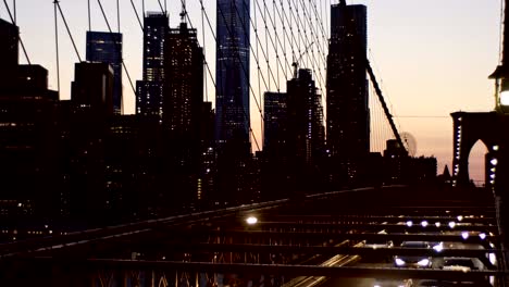 new york city aerial view over manhattan with brooklyn bridge blurred lights night view skyline, abstract background