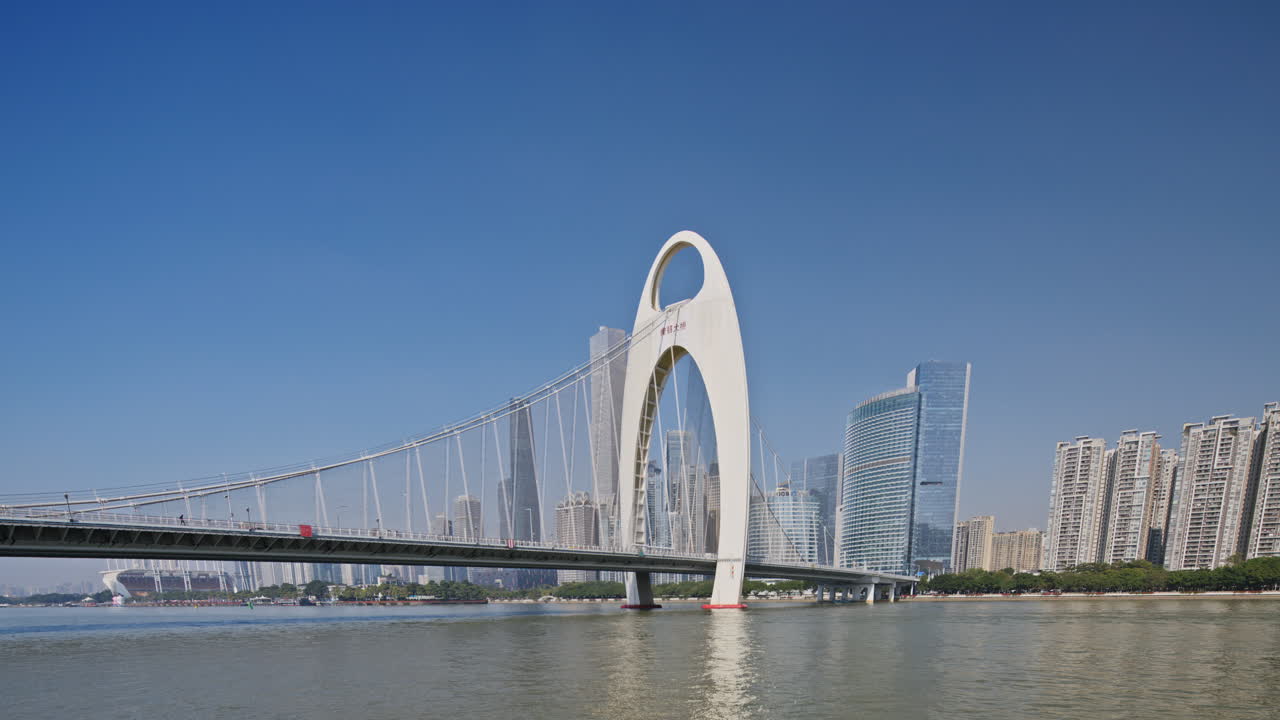 Modern Guangzhou Bridge Spanning Pearl River with City Skyline