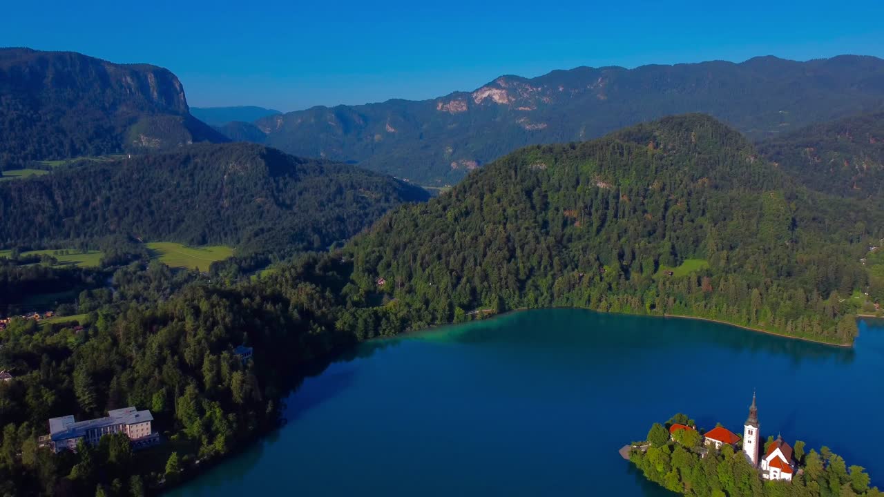 Aerial view of Lake Bled and Lake Bled Island with alp mountains and forests - Bled, Slovenia