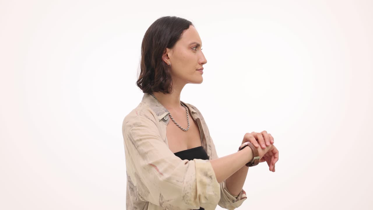Young Woman Checking Her Smartwatch