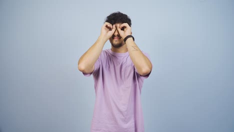 Man-with-binoculars-looking-away.