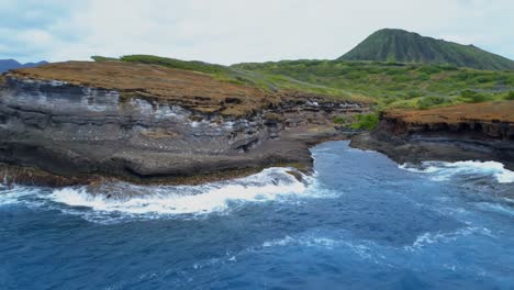 sea surrounded by cliff and mountain 4k