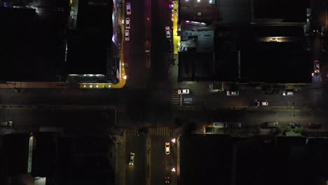 zona norte, tijuana mexico at 6:00am near the gentlemen's club hong kong.top view, moving forward with cars driving below.