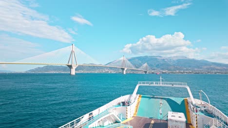ferry approaching a cable-stayed bridge over the sea
