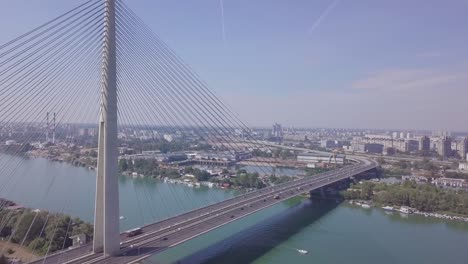 fantastic 4k long aerial orbiting shot of ada bridge in belgrade, serbia