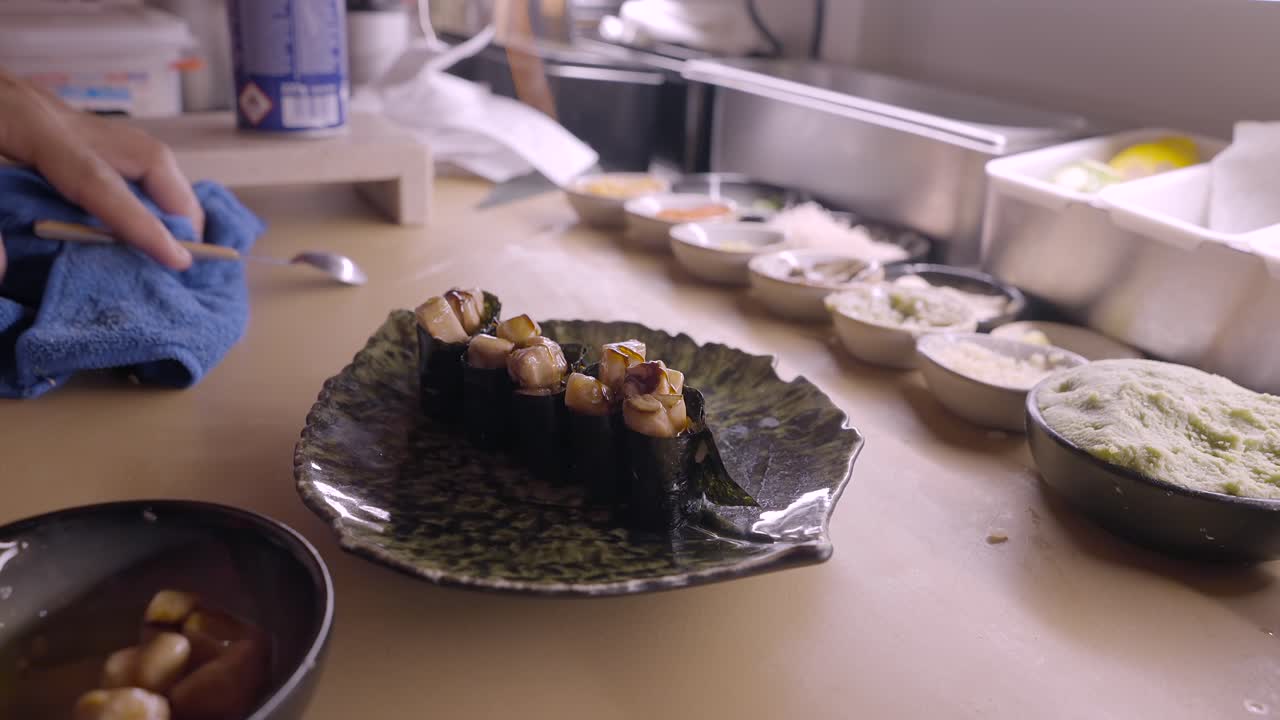 Sushi Preparation in a Kitchen