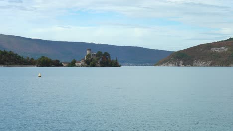 One-of-the-largest-and-most-pristine-lakes-in-France,-Lake-Annecy-is-fed-by-pure-mountain-springs-that-trickle-down-from-snow-capped-peaks