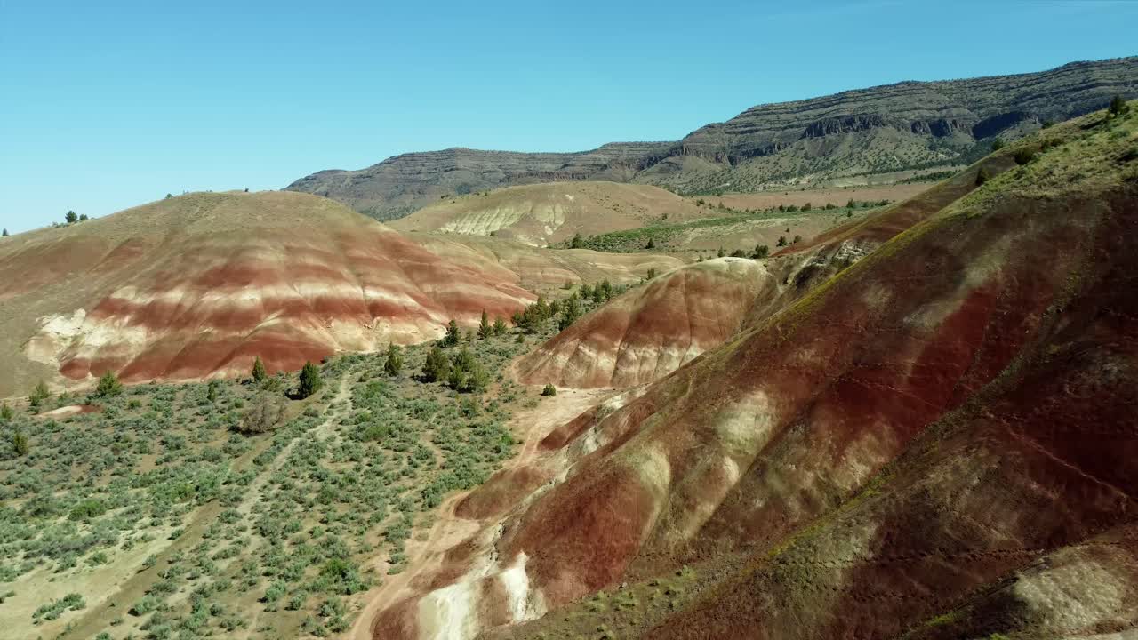 US, Oregon, Prineville, Painted Hills, 2025-05-06 - Drone view of the beautiful red soils just outside the John Day Fossil Beds National Monument
