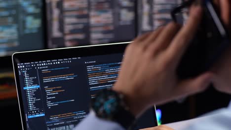 programmer working on a laptop