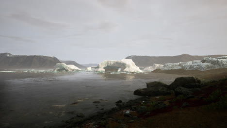 Blue-icebergs-of-Antarctica-with-frozen-and-snow-covered-Antarctic-scenery