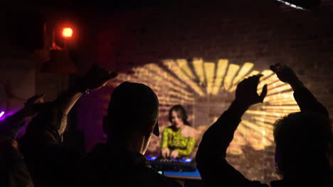 woman djing at the disco