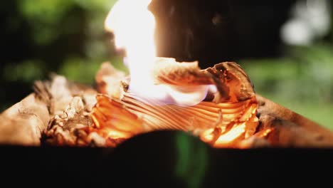 fire burning paper and charcoal in grill