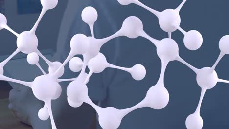 animation of molecules over caucasian man using tablet