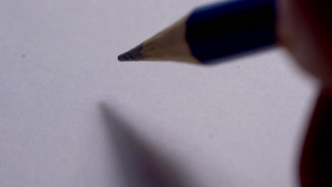 hand writing hello on white paper sheet