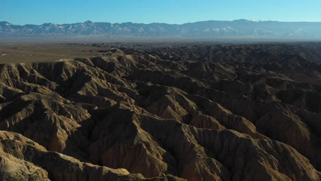 tilting up and revealing drone shot of the chary canyon's valley in kazakhstan