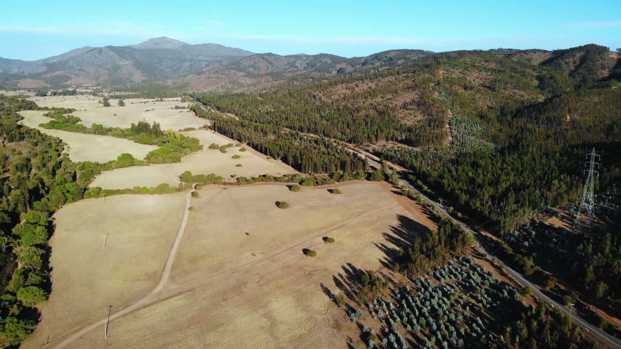 Aerial View of Rural Landscape with Mountains and Fields