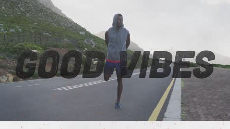 animación de las palabras buenas vibraciones sólo en negro sobre el hombre haciendo ejercicio en el camino de la montaña