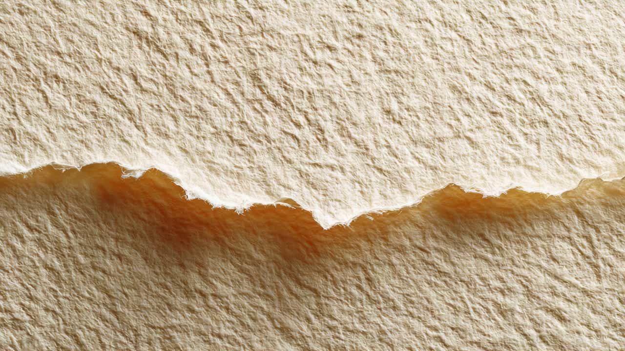 A Close-Up Look at Torn Handmade Paper: Textured Undulations and Natural Edges Captured in Two Frames, Showcasing the Unique Characteristic of Artisanal Craftsmanship