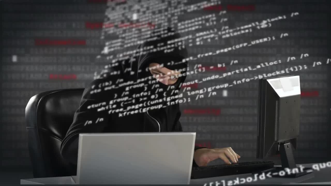 Animation of data processing over caucasian hacker using computer